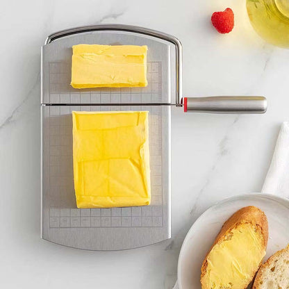Cortador de Queso Multifunción con Escala - Rebanador de Queso, Mantequilla y Jamón de Acero Inoxidable, Base Antideslizante, Incluye Afilador