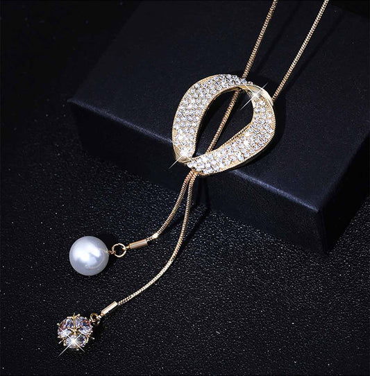 Elegante collar largo de perlas para suéter, de estilo moderno y versátil, con diseño sencillo y flecos; un accesorio de moda ideal para otoño e invierno.